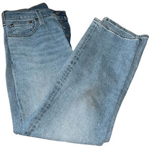 Levi’s 501 jeans, size 6. These are five pocket, button fly jeans.